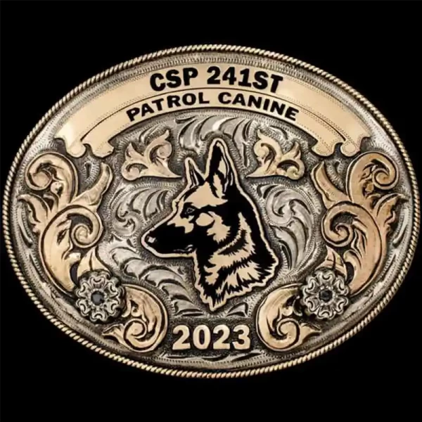"Our Snyder Belt Buckle is a traditional, classic design, crafted on a German Silver base with Jeweler's Bronze accents, from the banners to the rope edge, to our signature western-inspired scrollwork. Our German Silver flowers are accented with your